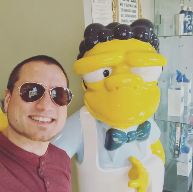 With a Simpsons character figure on the studio lot