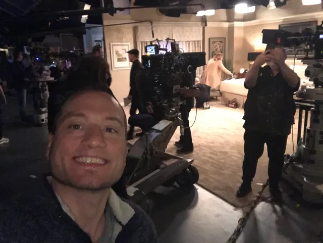 On set among cameras and production crew